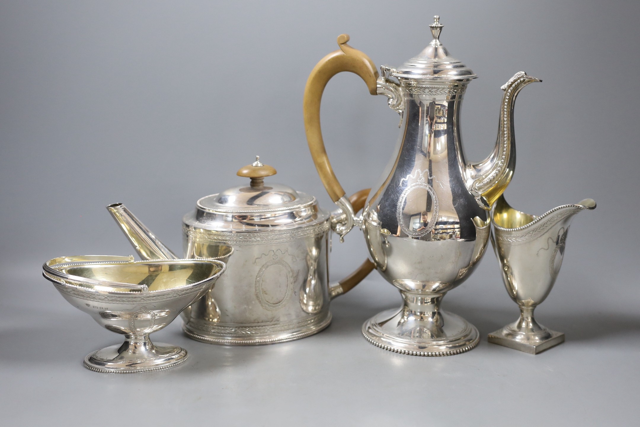 A modern George III style silver four piece tea and coffee service by C.J. Vander Ltd, London, 1969, gross weight 60 oz.